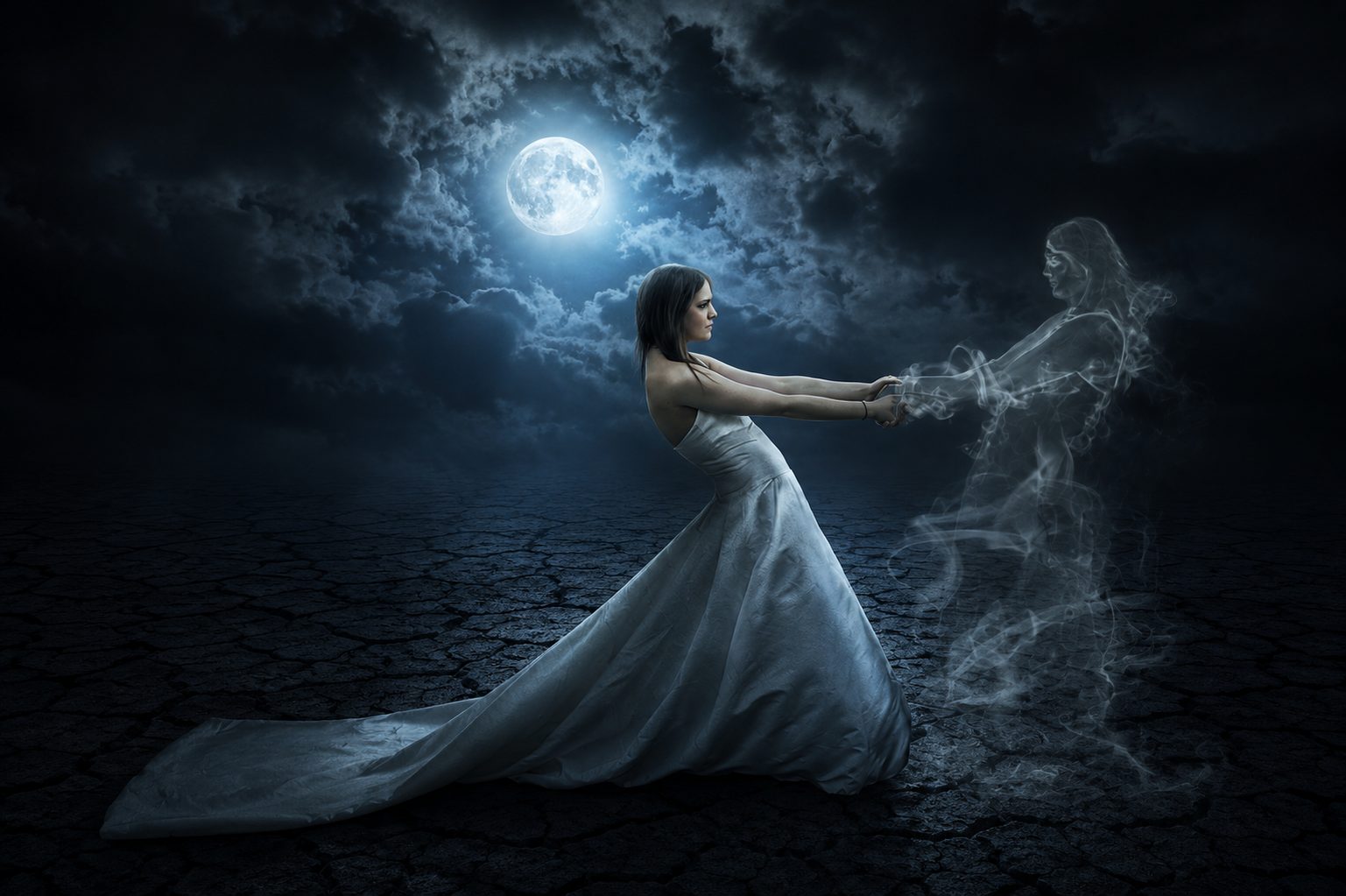 Drama shot of a woman in a long white gown on cracked desert ground under a full moon, reaching toward a translucent smoke figure