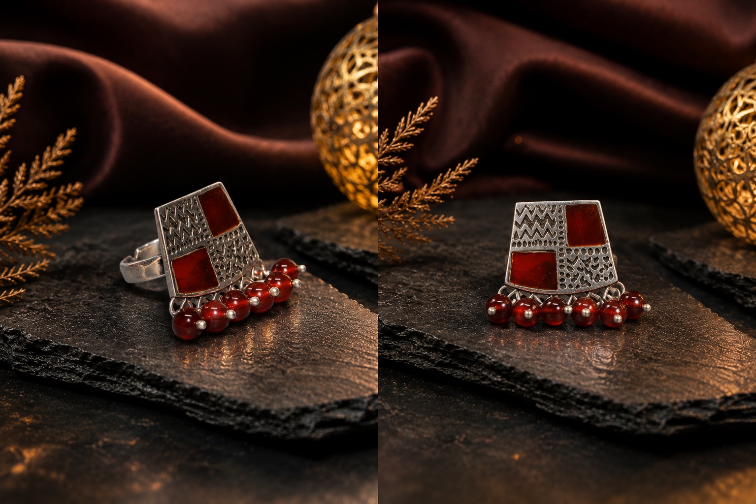 Silver statement ring set with deep red carnelian panels on black slate, shot as dark cinematic product photography